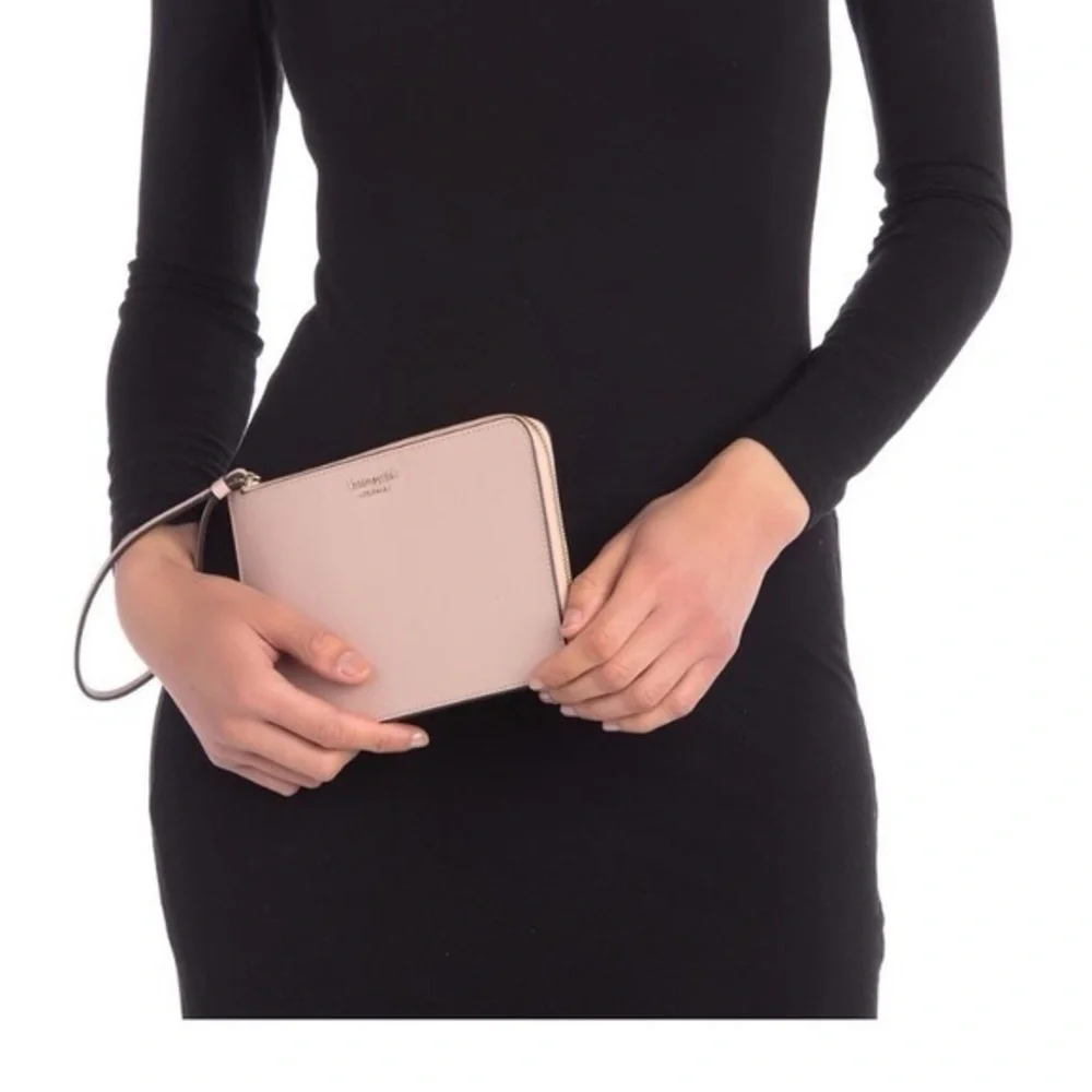 Kate Spade ♠️ NWOT GENUINE blush Pink soldout color Wristlet,gold pin mount logo